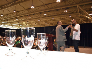 Marco Renda handing out awards at the Treating Yourself Expo.